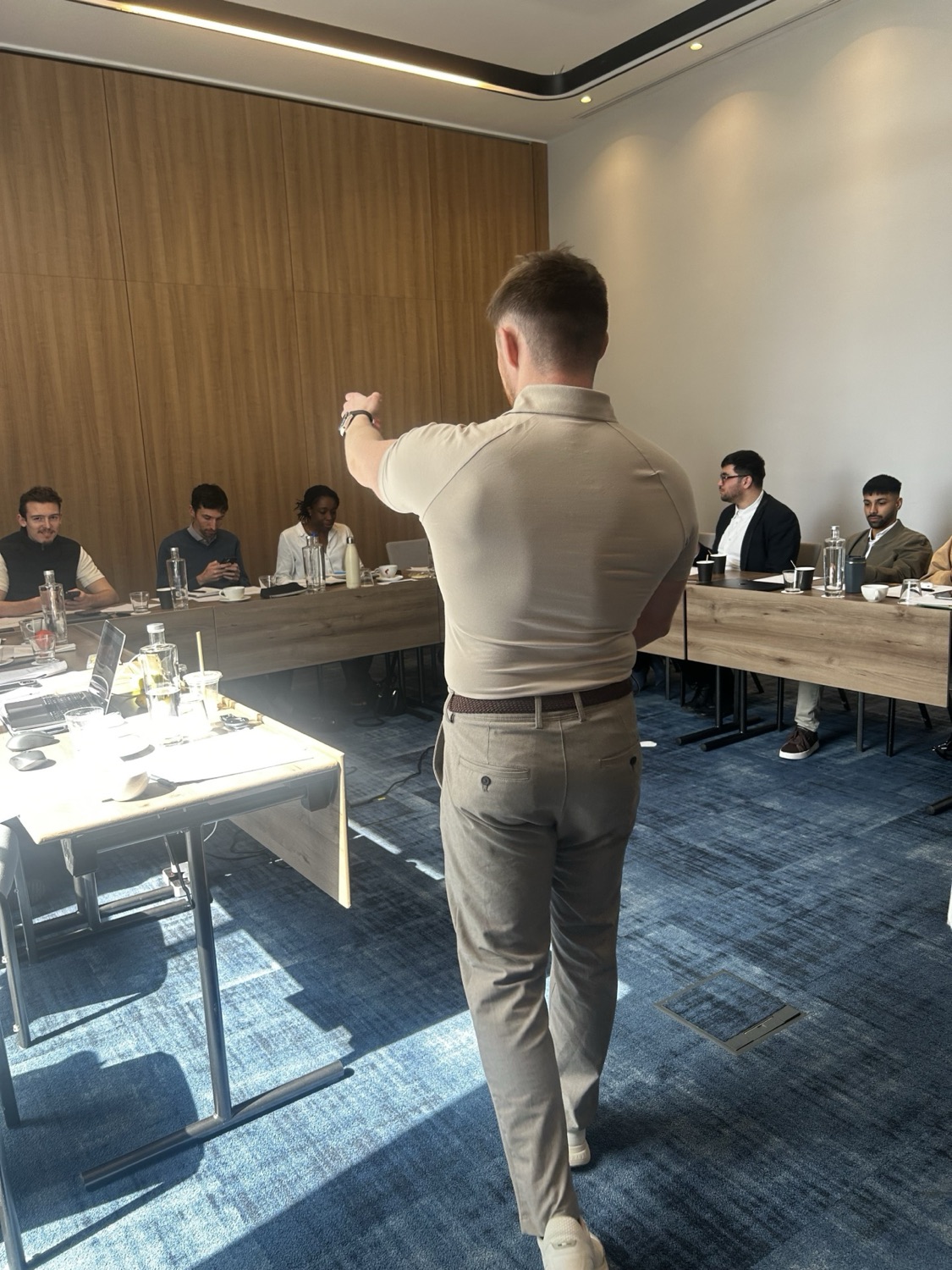 Lewis Hunter delivering a mastermind session in Romania